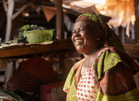 medium-shot-smiley-woman-outdoors
